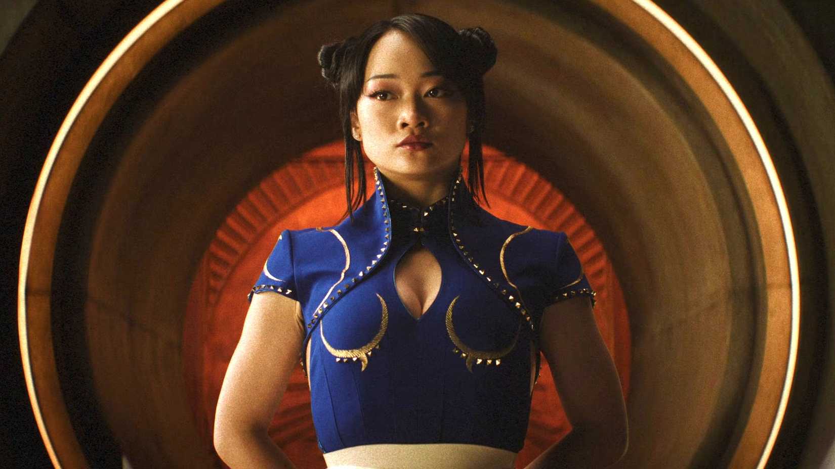 Callina Liang as Chun-Li posing against a wall in Street Fighter 2026