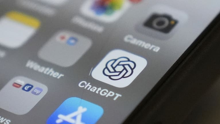 ChatGPT app icon is seen on a smartphone screen in Chicago.