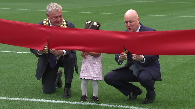 Chch Mayor Phil Mauger and PM Christopher Luxon cut the ribbon marking the opening of the new christchurch stadium