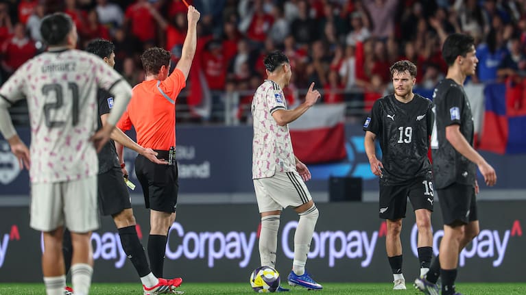 Chile's Darío Osorio is sent off by Australian referee Jack Morgan against the All Whites for a foul on Kosta Barbarouses.