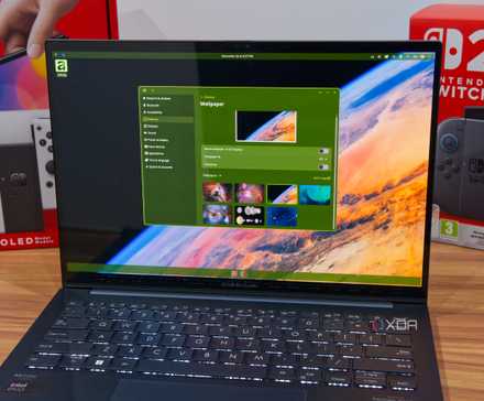 A laptop running the COSMIC desktop and showing the COSMIC Settings app