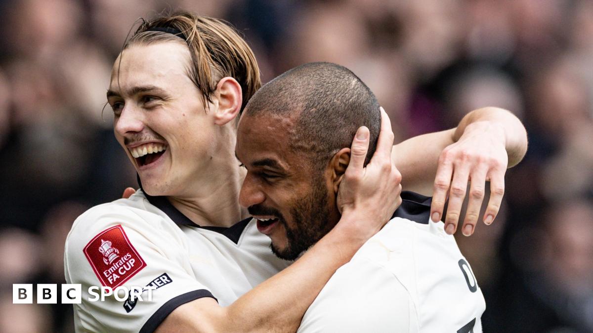 Ben Waine celebrates with Funso Ojo
