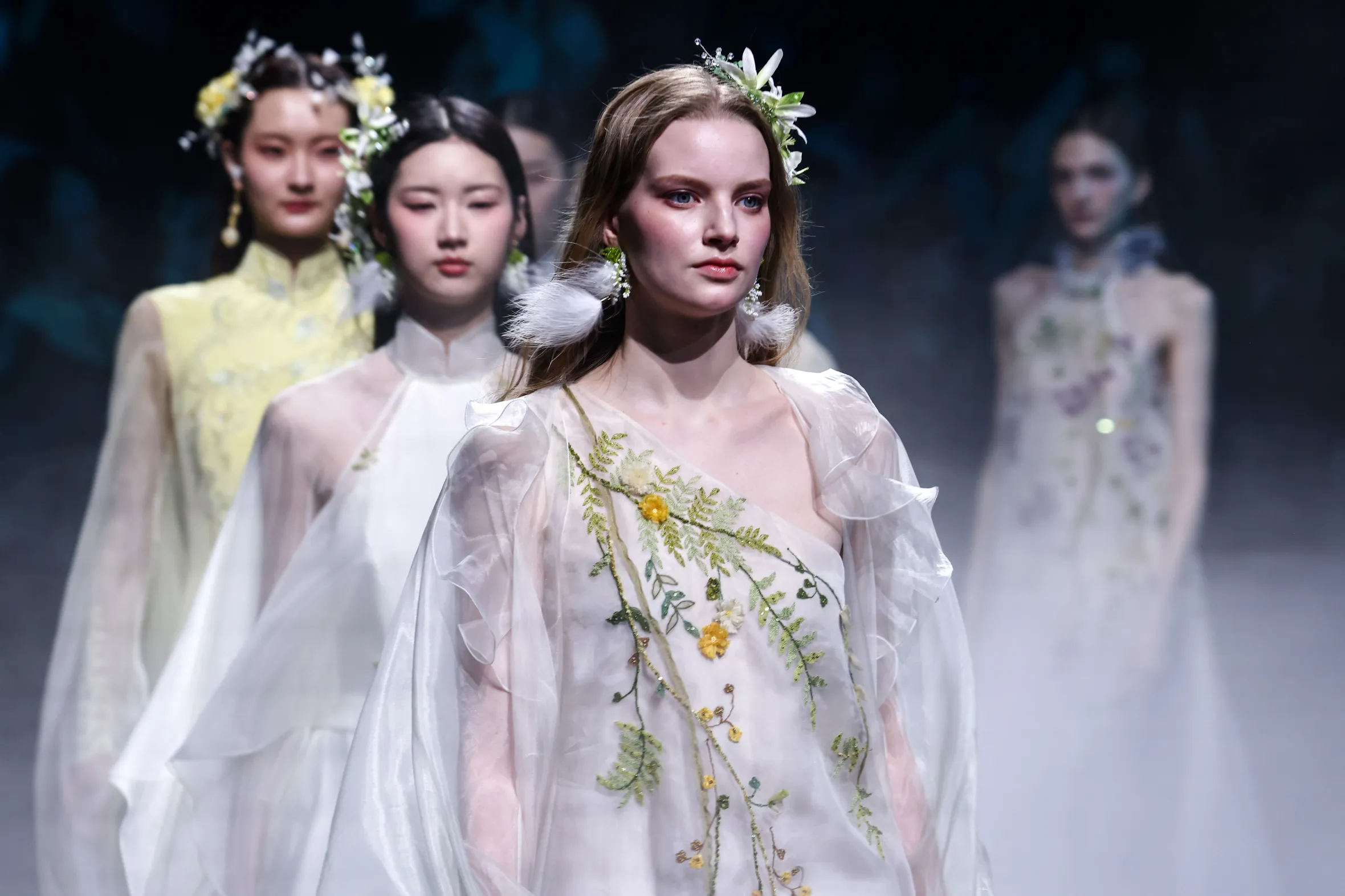 Models presenting creations by HEAVEN GAIA by Ying Xiong at China Fashion Week.