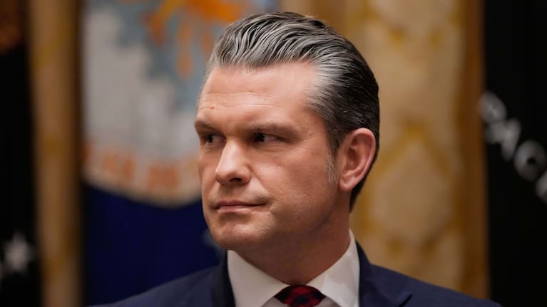 Defence Secretary Pete Hegseth listens as President Donald Trump speaks during a Cabinet meeting at the White House, Tuesday, Dec. 2, 2025,