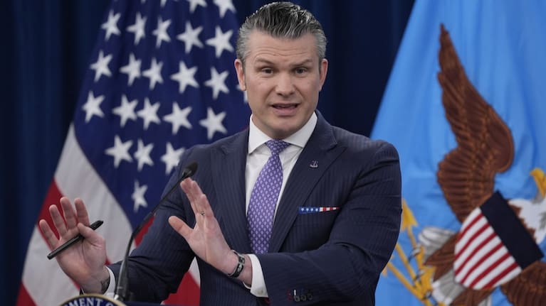 Defense Secretary Pete Hegseth speaks to members of the media during a press briefing at the Pentagon in Washington.