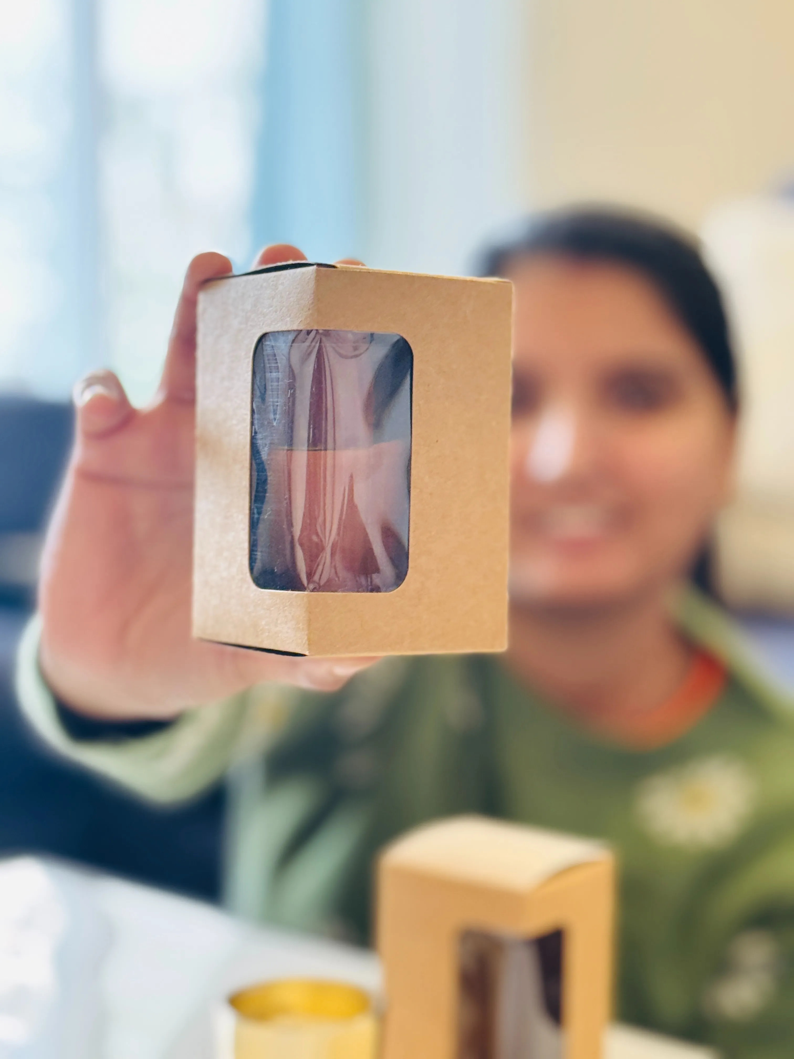 Entrepreneur Shruti Kundan with her candle product