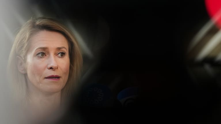 European Union foreign policy chief Kaja Kallas speaks with the media as she arrives for a meeting of EU foreign ministers at the European Council building in Brussels.