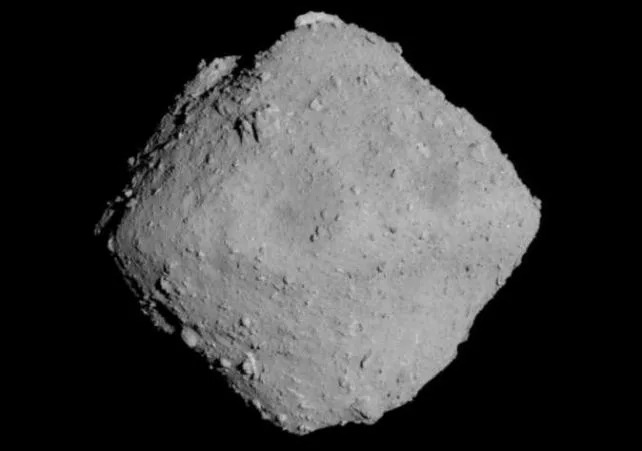 Ryugu is a '<a href="https://doi.org/10.1126/science.aav8032" rel="nofollow noopener" target="_blank" data-ylk="slk:rubble pile;elm:context_link;itc:0;sec:content-canvas" data-yga="{"yLinkElement":"context_link","yModuleName":"content-canvas","yLinkText":"rubble pile"}" class="link ">rubble pile</a>' asteroid around 1 kilometer (0.6 miles) in diameter. (<a href="https://www.dlr.de/en/images/2018/3/asteroid-ryugu_31672" rel="nofollow noopener" target="_blank" data-ylk="slk:JAXA, University of Tokyo, Kochi University, Rikkyo University, Nagoya University, Chiba Institute of Technology, Meiji University, University of Aizu, and AIST;elm:context_link;itc:0;sec:content-canvas" data-yga="{"yLinkElement":"context_link","yModuleName":"content-canvas","yLinkText":"JAXA, University of Tokyo, Kochi University, Rikkyo University, Nagoya University, Chiba Institute of Technology, Meiji University, University of Aizu, and AIST"}" class="link ">JAXA, University of Tokyo, Kochi University, Rikkyo University, Nagoya University, Chiba Institute of Technology, Meiji University, University of Aizu, and AIST</a>)