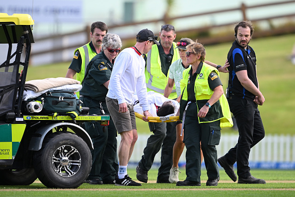 Zimbabwe's Kelis Ndhlovu is stretchered from the field at Dunedin's University Oval during the...