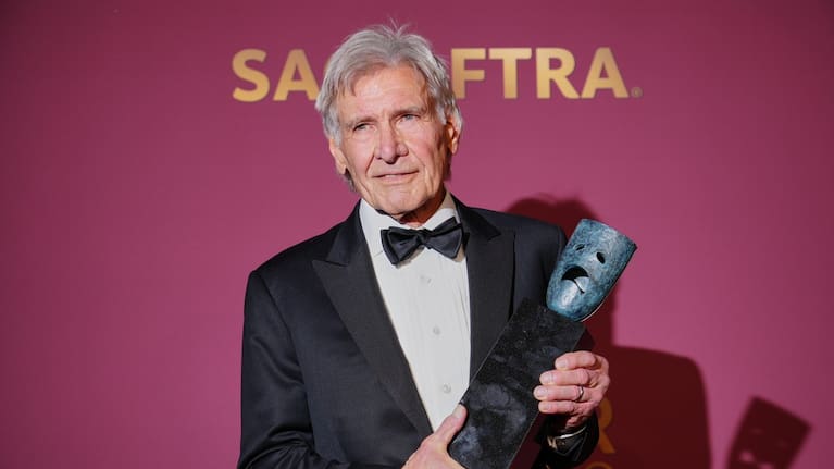 Harrison Ford poses in the press room with the lifetime achievement award during the 32nd Annual Actor Awards. (Source: Jordan Strauss/Invision/AP)