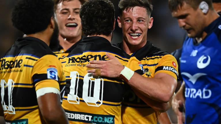 Hurricanes halfback Cam Roigard celebrates a Callum Harkin try, Super Rugby Pacific, Hurricanes v Western Force, McLean Park, Napier. 