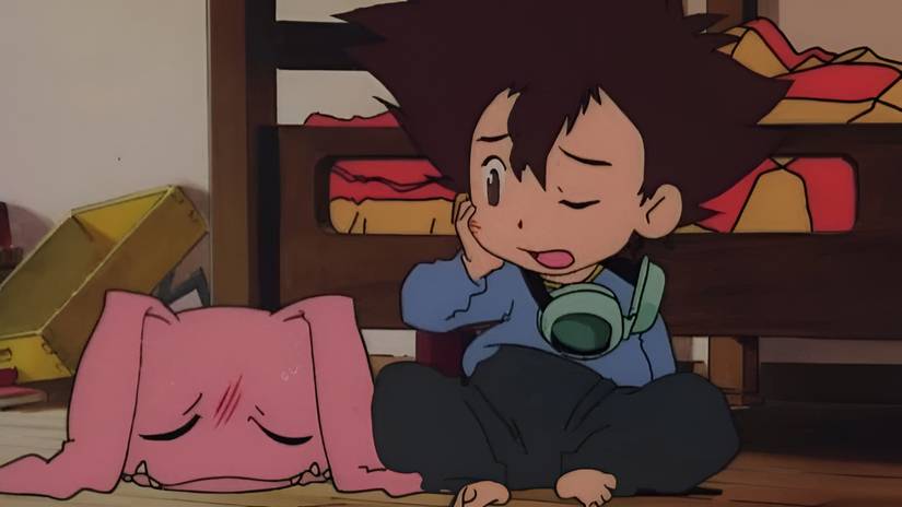 A small child clutches his cheek and a pink monster looks sad in Digimon Adventure