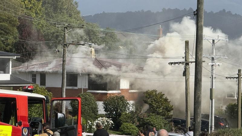 Concord house fire contained, two taken to hospital