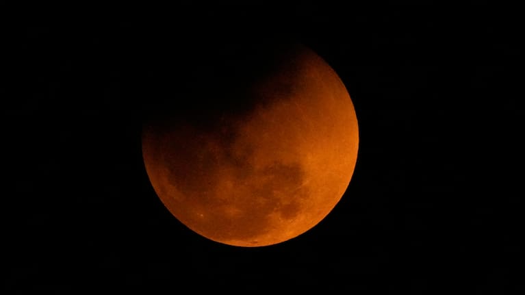 The blood moon is seen shortly after a total lunar eclipse in Guwahati, India, Tuesday, March 3, 2026.