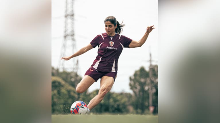 Iranian soccer player Atefeh Ramezanisadeh kicks a ball at a Brisbane Roar club training session in Brisbane, Australia. (Source: Brisbane Roar via AP)