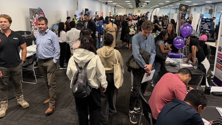 Job seekers flood a job fair at Auckland's Go Media Stadium.