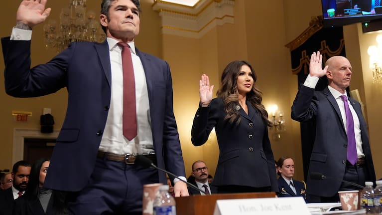 Joseph Kent, director of the National Counterterrorism Centre, Homeland Security Secretary Kristi Noem, and Michael Glasheen.