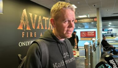 Chris Hipkins arrives back in New Zealand amid questions over ex-wife’s allegations