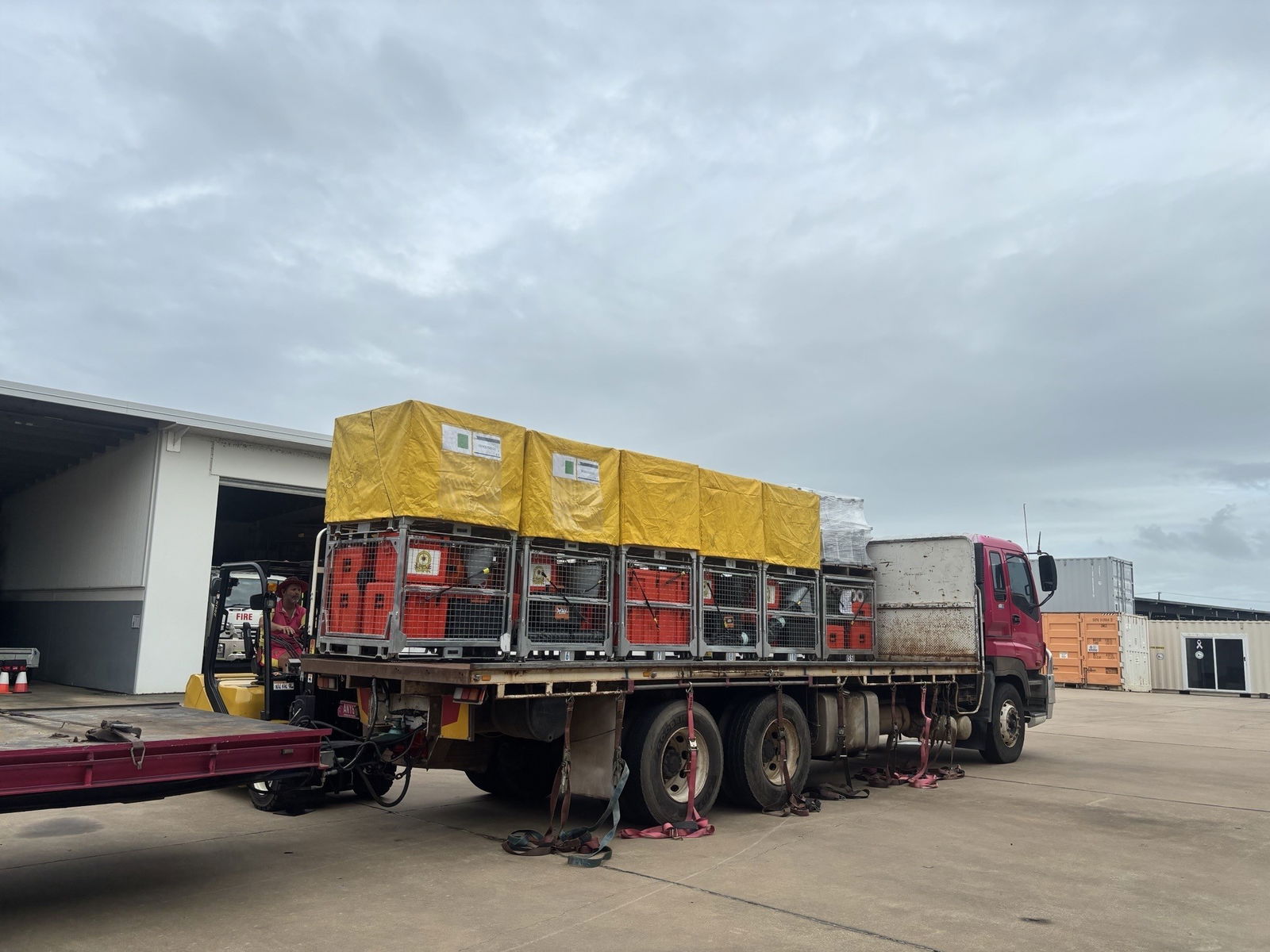A truck with pods on the back. 