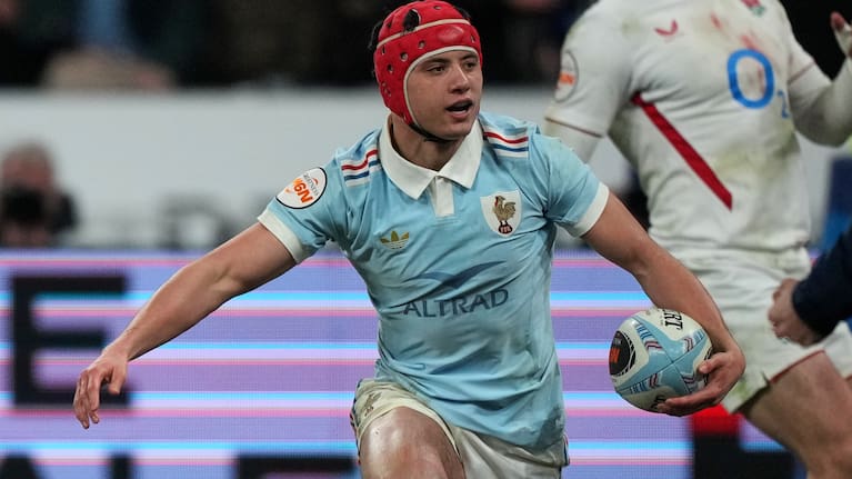 Louis Bielle‑Biarrey of France celebrates one of his four tries against England.