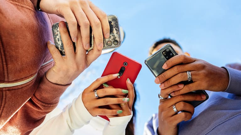 People looking down at their phones.