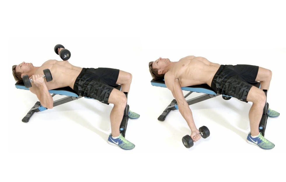 Man completing lying bicep curls on a bench man completing lying bicep curls on a bench