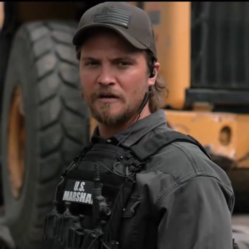 Luke Grimes as Kayce Dutton in Marshals on Paramount+ luke grimes as kayce dutton in marshals on paramount+ wearing us marshal gear