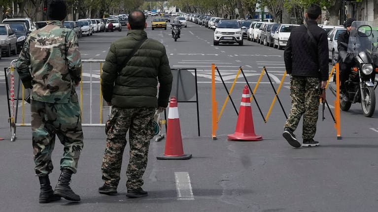 Members of the Basij paramilitary force stand at a checkpoint in Tehran, Iran, Sunday, March 29, 2026. 