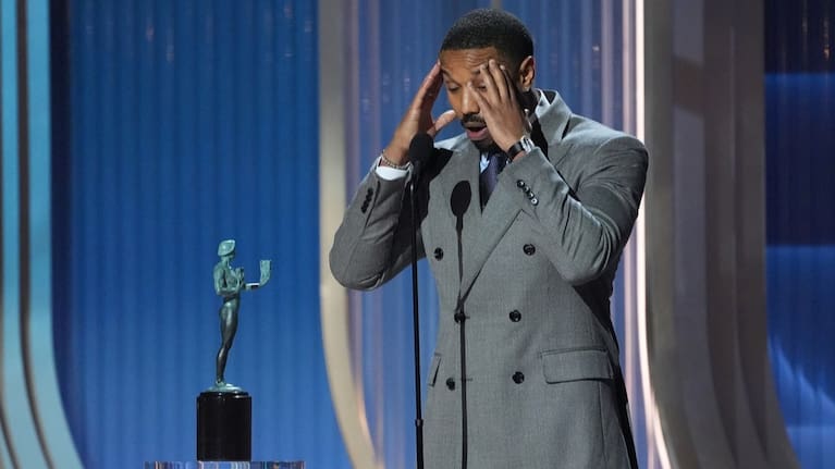 Michael B. Jordan accepts the award for outstanding performance by a male actor in a leading role for Sinners during the 32nd Annual Actor Awards.