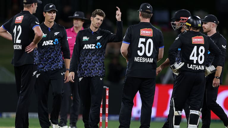 Mitchell Santner, captain of New Zealand (C) gestures during game one in the Men's T20 International series between New Zealand and South Africa at Bay Oval.