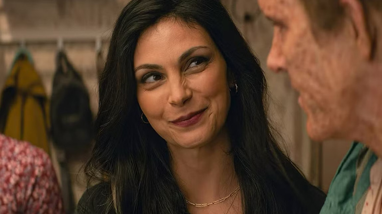 Morena Baccarin as Vanessa, smiling at Ryan Reynolds' Wade Wilson in Deadpool and Wolverine.