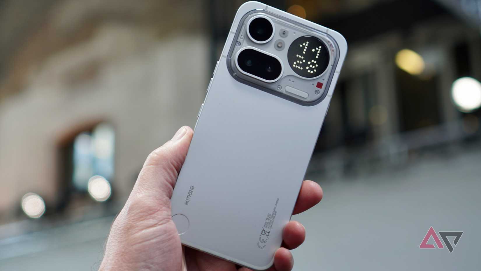 A person holding the Nothing Phone (4a) Pro