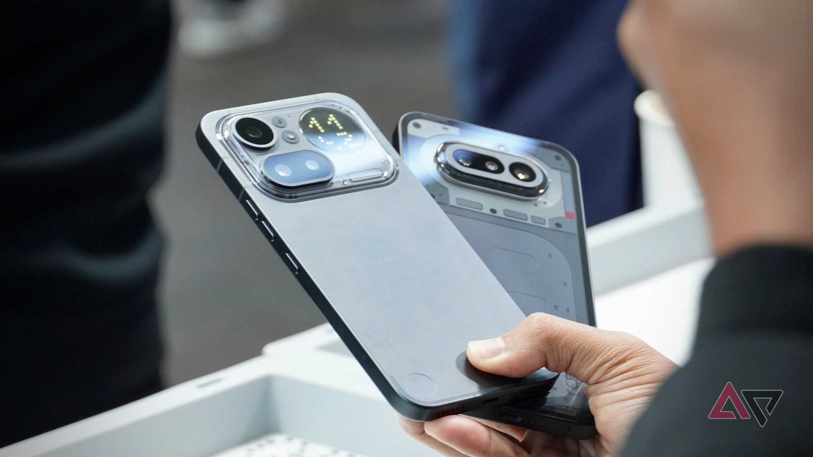 A person holding the Nothing Phone (4a) Pro