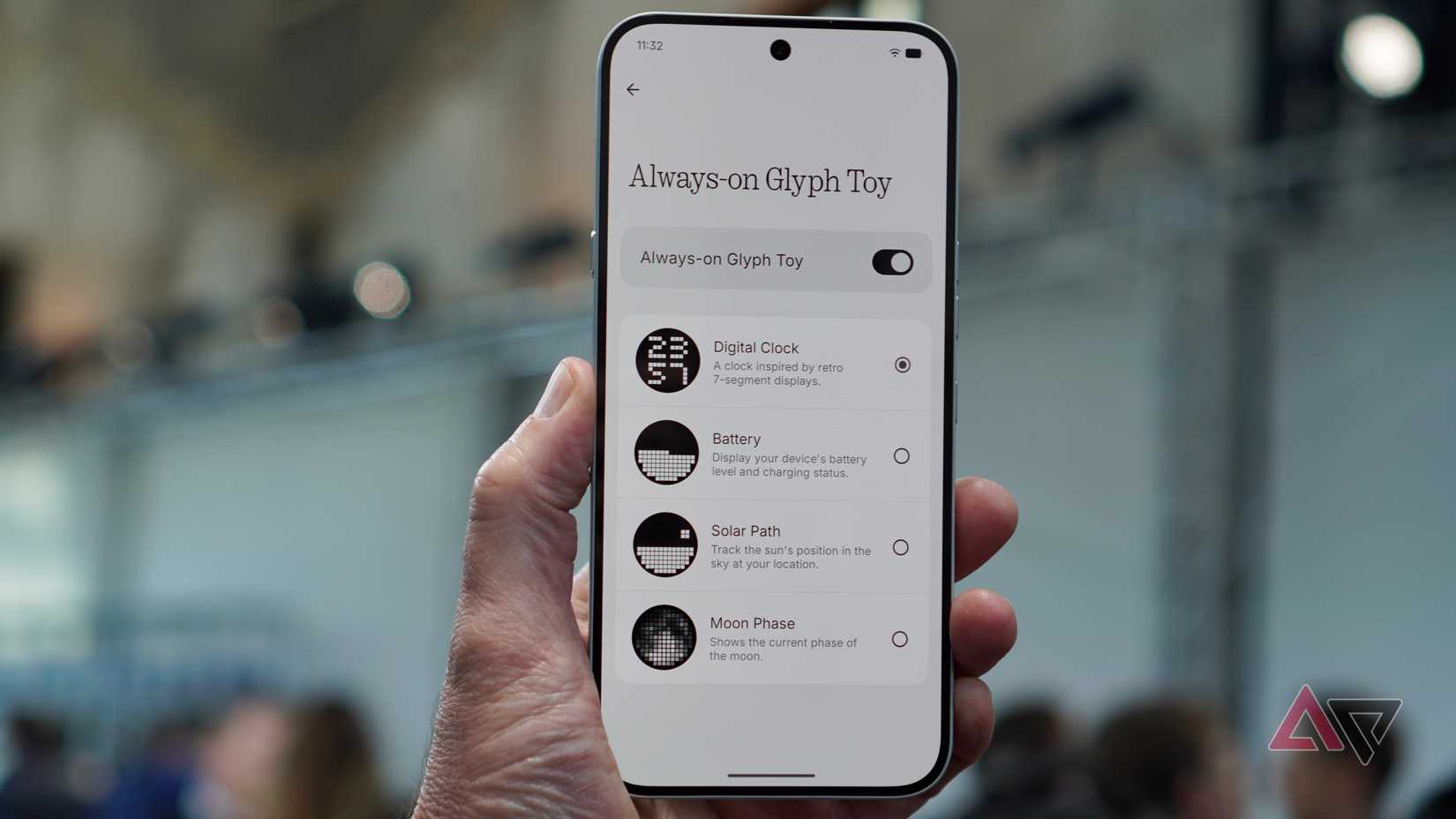 A person holding the Nothing Phone (4a) Pro