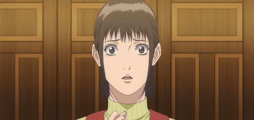 A young girl looks scared as she looks ahead in Liar Game