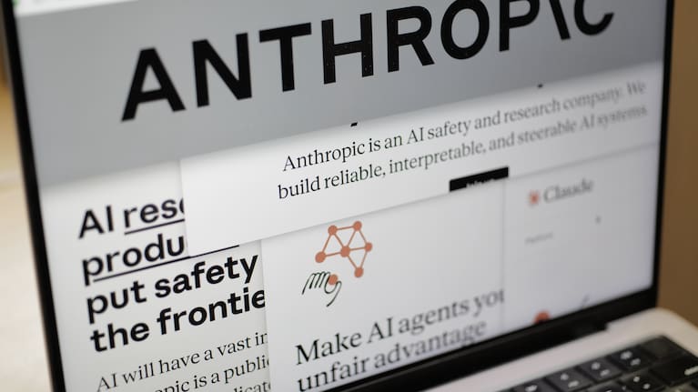Pages from the Anthropic website and the company's logo are displayed on a computer screen in New York on Thursday, Feb. 26