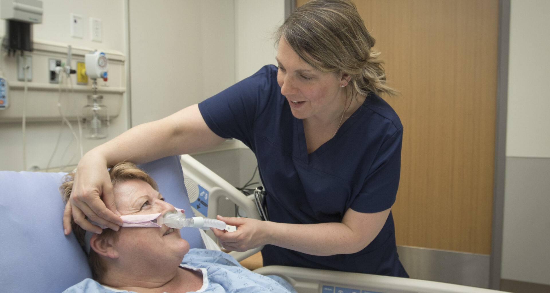 Patient with CPAP machine (Continuous positive airway pressure therapy)