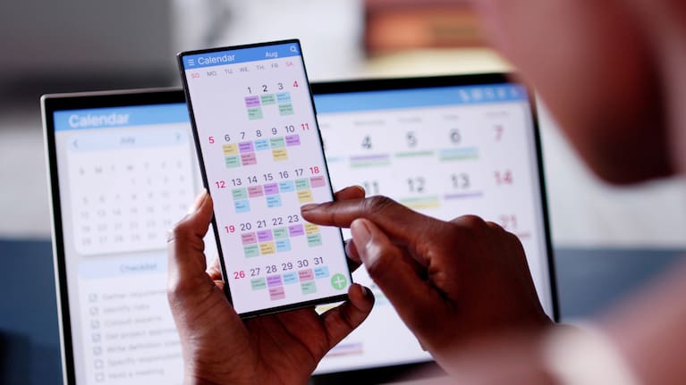 Scrolling through a digital calendar.