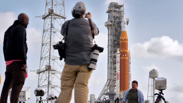 Photographers setup remote cameras near NASA's Artermis II moon rocket on Launch Pad 39-B at the Kennedy Space Center Sunday, March 29, 2026, in Cape Canaveral, Fla.