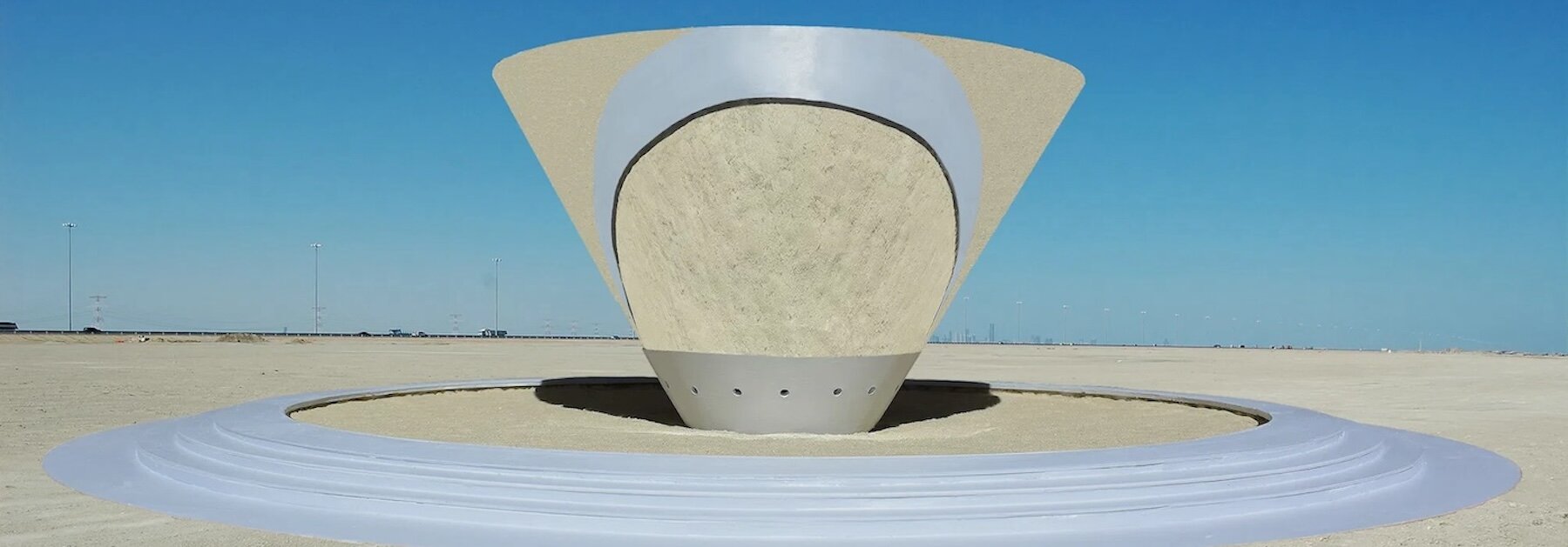 playful interactive cone installation reflects viewers sand art