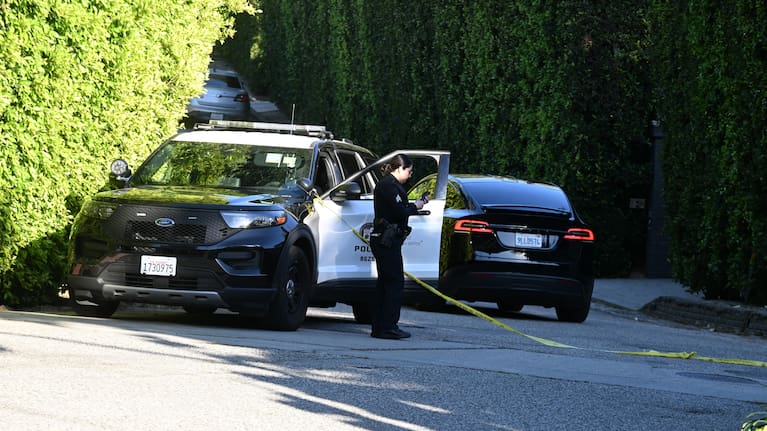 Police at the Los Angeles home of pop star Rihanna after shots were fired at her house.