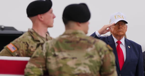 Fox News apologises for using old video of hatless Trump at ceremony