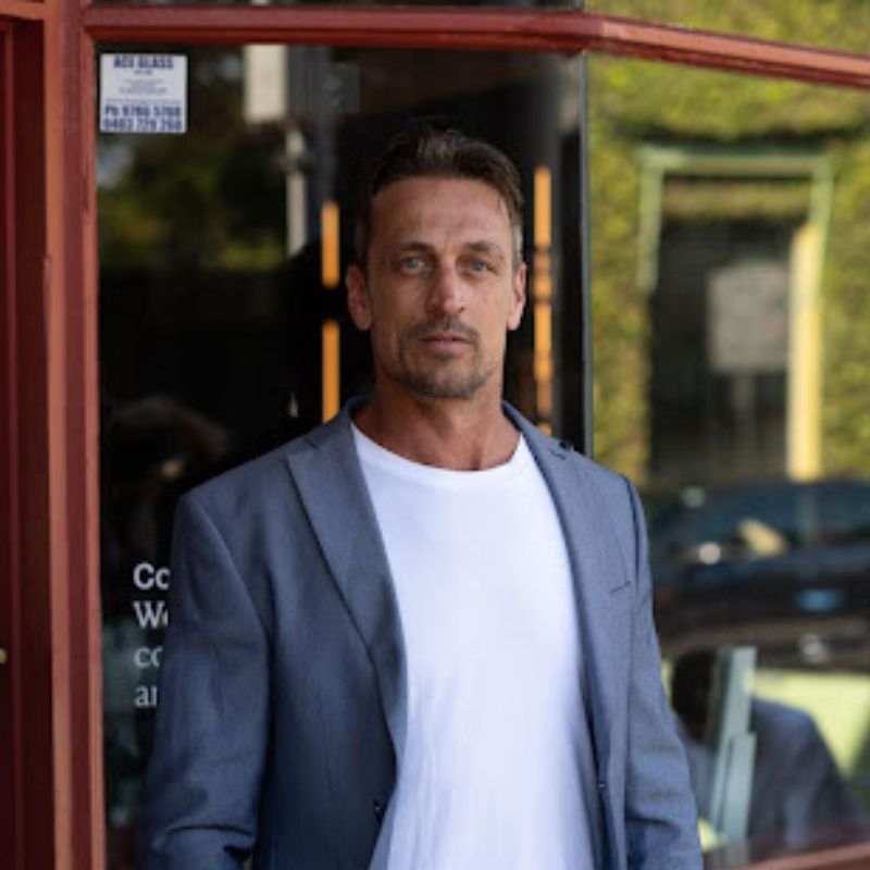 portrait of man in t-shirt and jacket