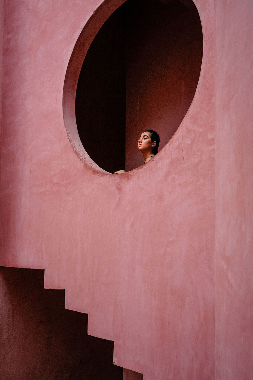 red-toned stucco surfaces form layered facade for boutique hotel by RA! in mexico - 7