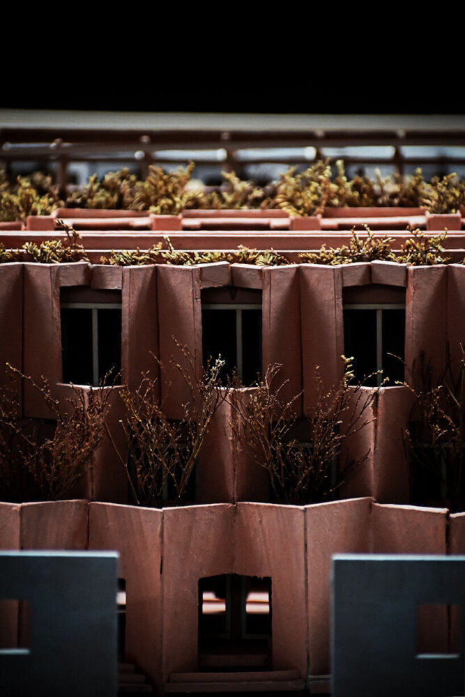 repetition of faceted openings creates depth and shadow across the elevation | gallery images courtesy of RA!