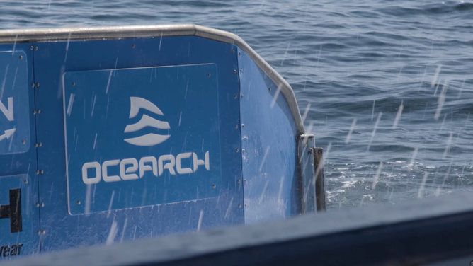 The OCEARCH logo on a boat during a shark tagging in 2020.