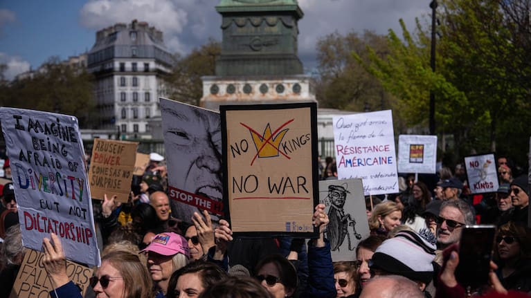 Signs held in the No Kings protest in Paris.