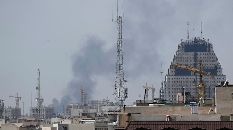 Smoke rises on the skyline after an explosion in Tehran, Iran.