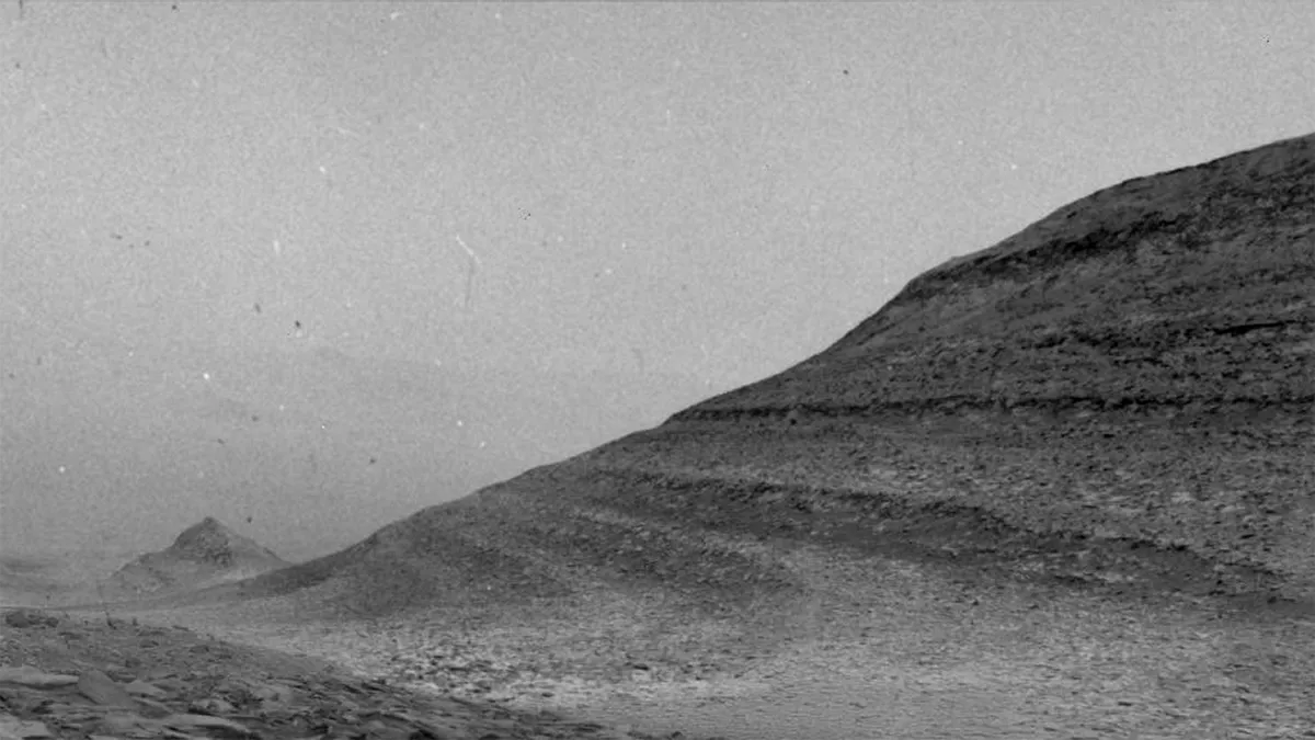 Specks in this image were caused by charged particles from a solar storm hitting one of the navigation cameras aboard NASA's Curiosity Mars rover. Credit: NASA/JPL-Caltech