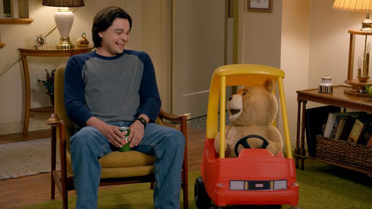 Ted is voiced by Seth MacFarlane and stars Max Burkholder as John Bennett.